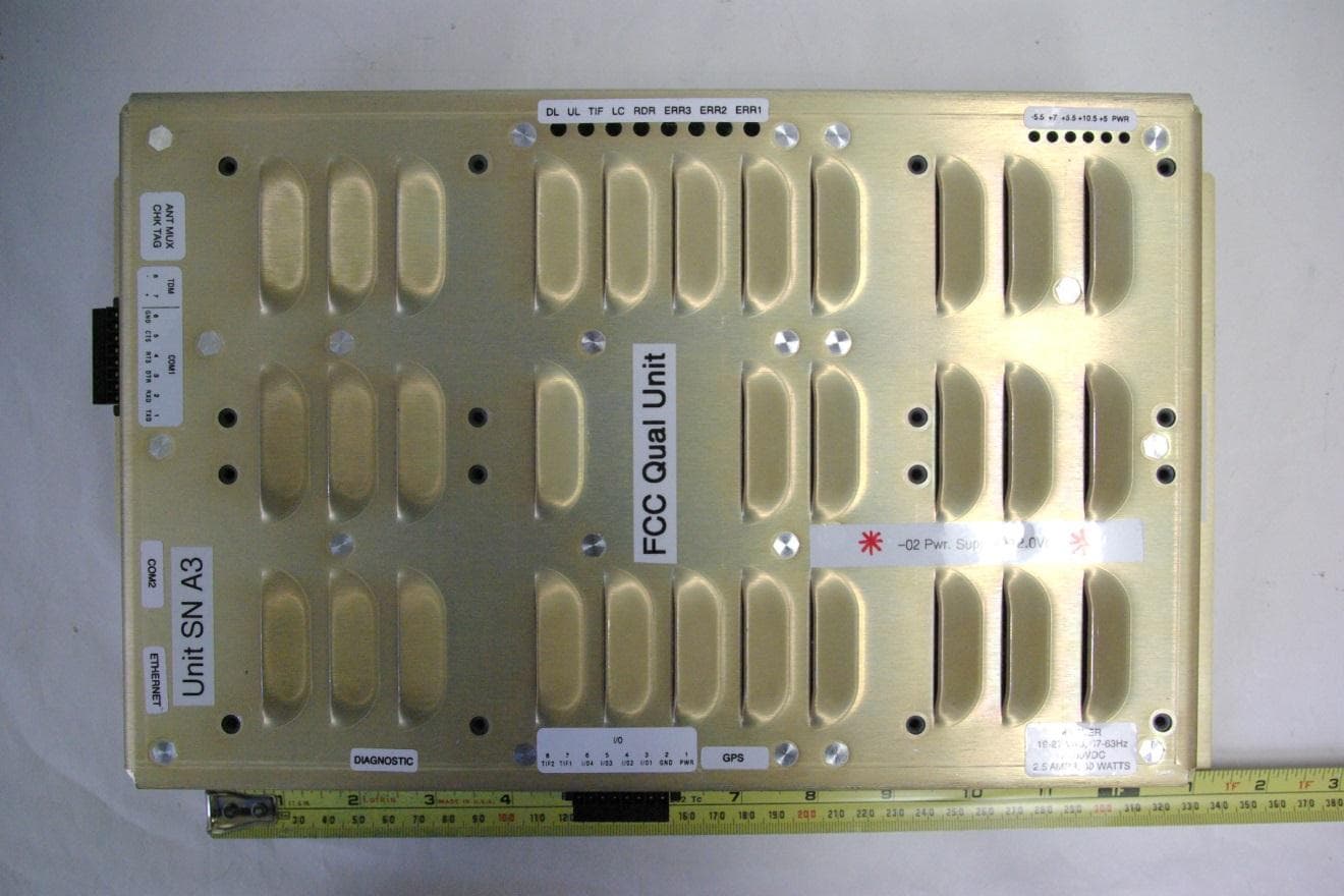 LOCATION MONITORING SERVICE TRANSMITTER - FCC ID FIHMPI6000A - TransCore