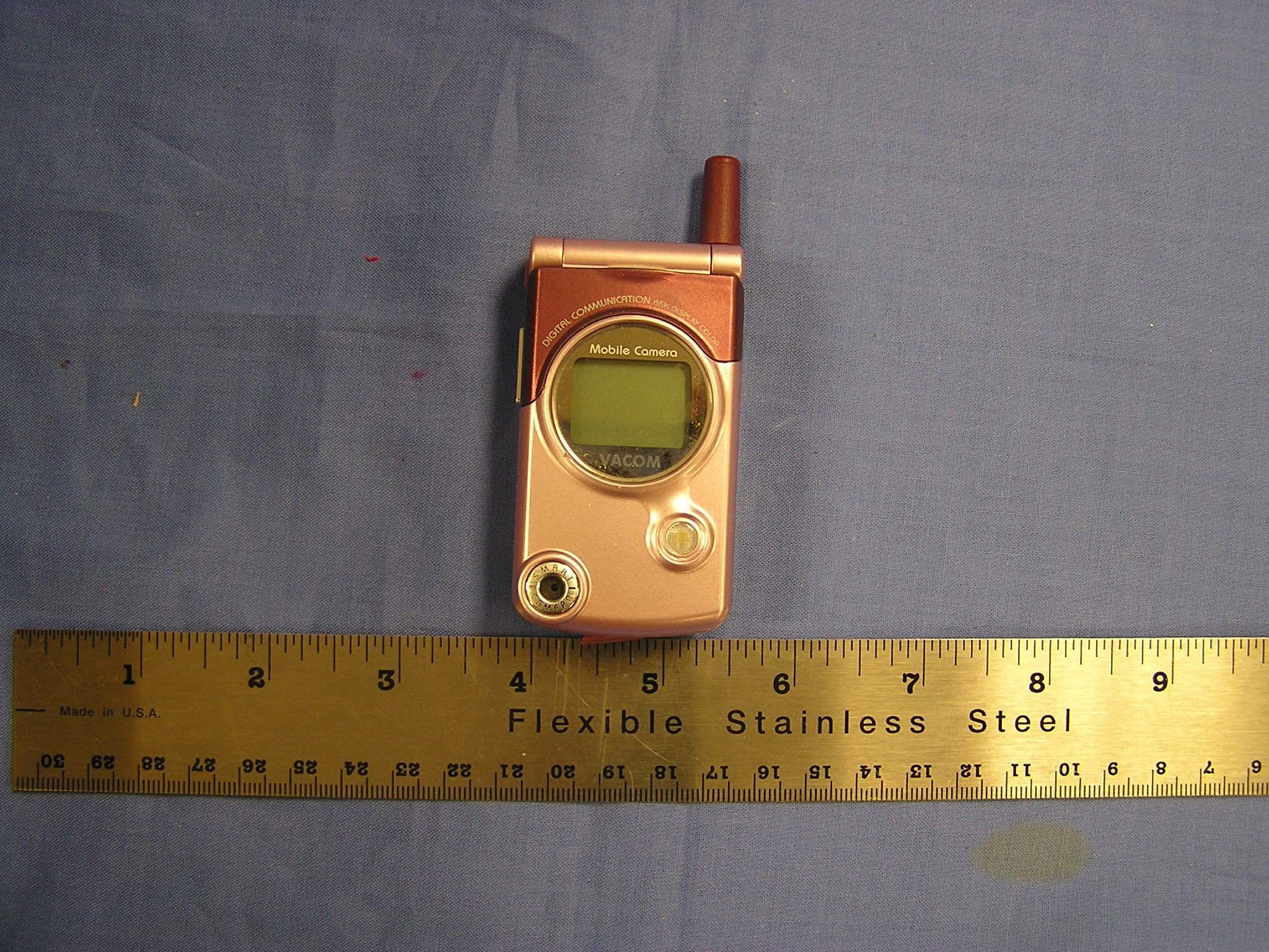 Tri-Mode Dual-Band Phone (AMPS/CDMA/ PCS CDMA) - FCC ID GKRVT820 - Compal Electronics Inc