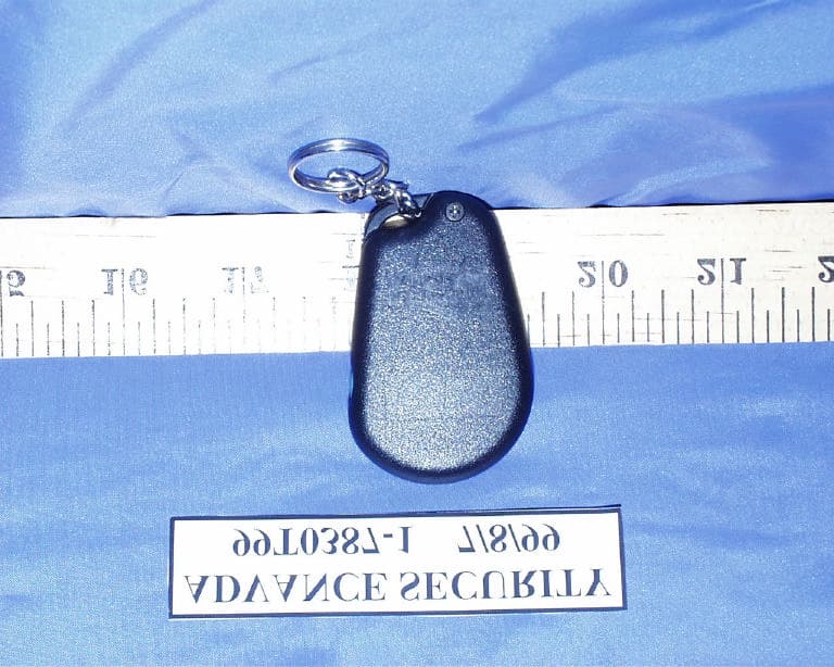 Car Alarm Transmitter - FCC ID H5OT09 - Advance Security Inc