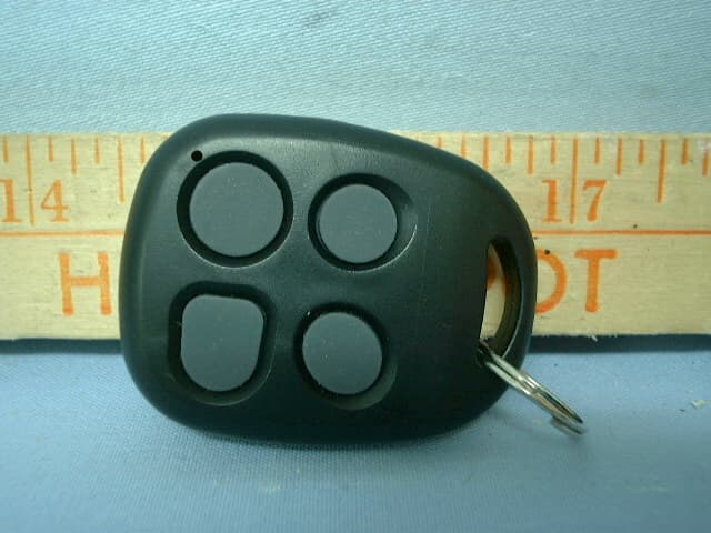 CAR ALARM TRANSMITTER - FCC ID H5OT12 - Advance Security Inc