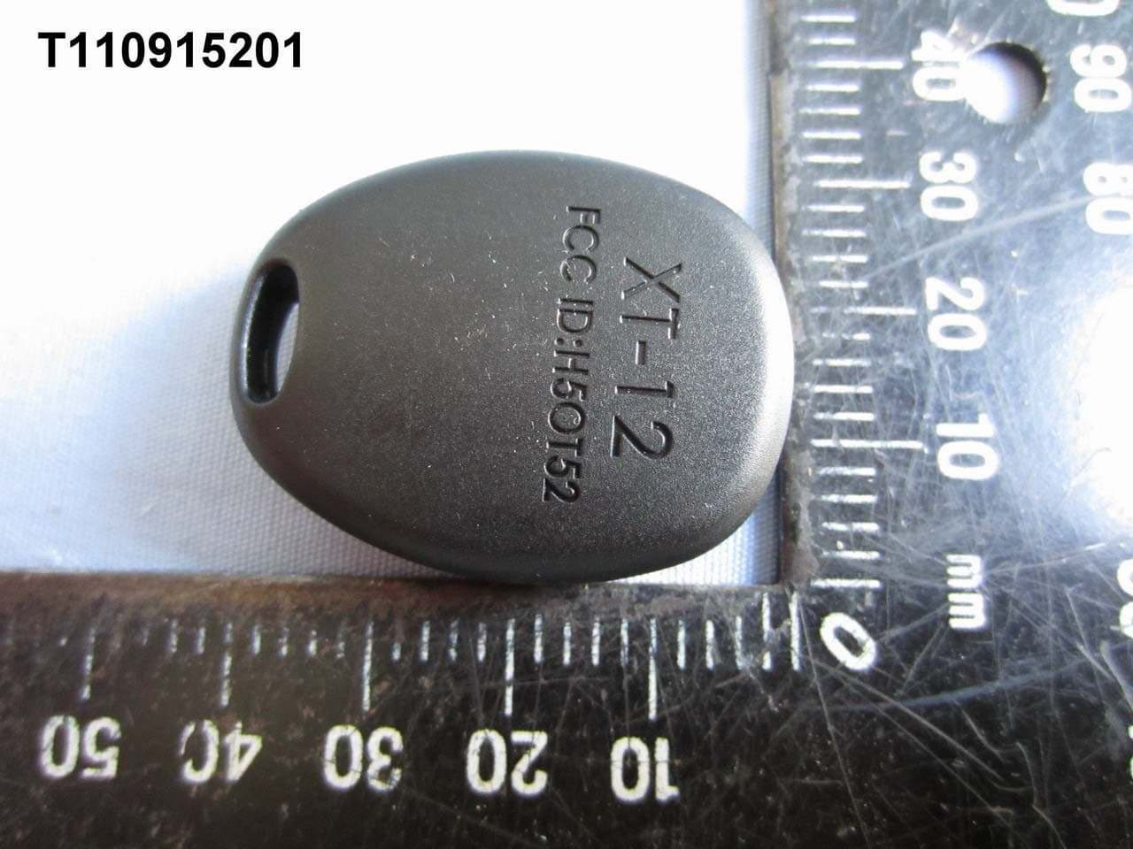 Car Alarm Transmitter - FCC ID H5OT52 - Advance Security Inc (2)