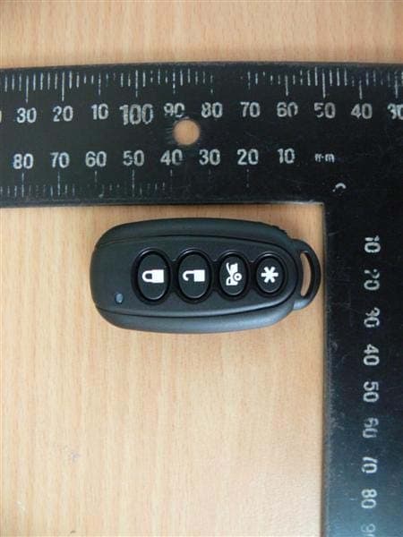 Remote Control - FCC ID H5OT57 - Advance Security Inc (3)
