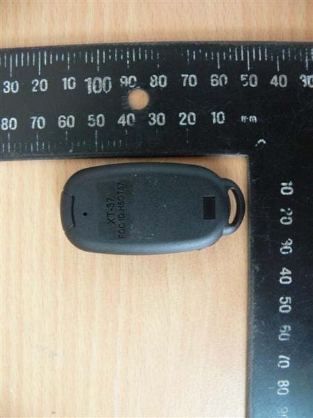 Remote Control - FCC ID H5OT57 - Advance Security Inc (4)