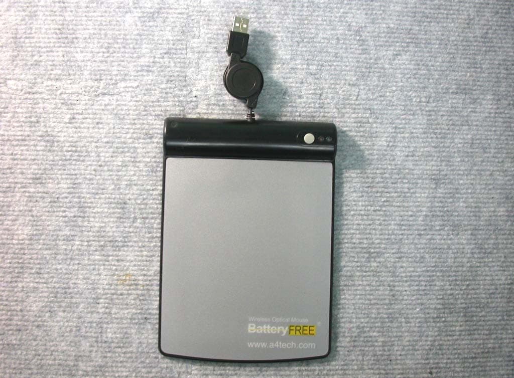 Wireless Battery Free Optical Mouse (Pad) - FCC ID H8GMPD3 - A Four Tech Co Ltd