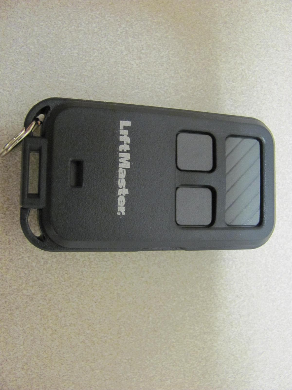 Remote Control Transmitter - FCC ID HBW7743 - Chamberlain Group LLC, The (2)