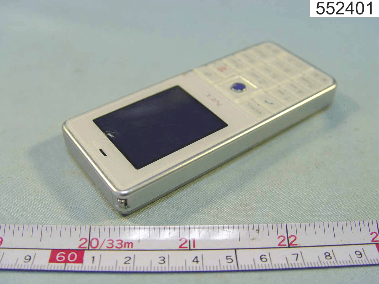 GSM Tri-Band Cellphone - FCC ID HFS-KMP6J1BH1 - Quanta Computer Inc