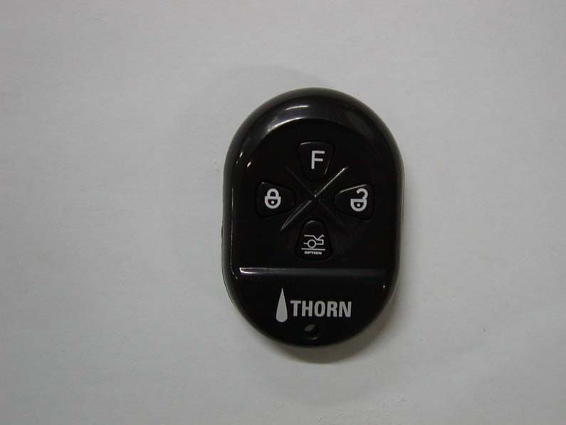 Remote Control Transmitter - FCC ID HH8THORNPLUSTX2 - Dong Yang Security Electronics Co