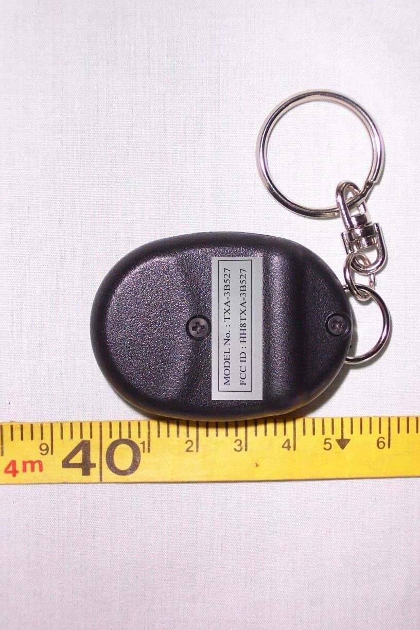 KEYLESS ENTRY SYSTEM - FCC ID HH8TXA-3B527 - Dong Yang Security Electronics Co