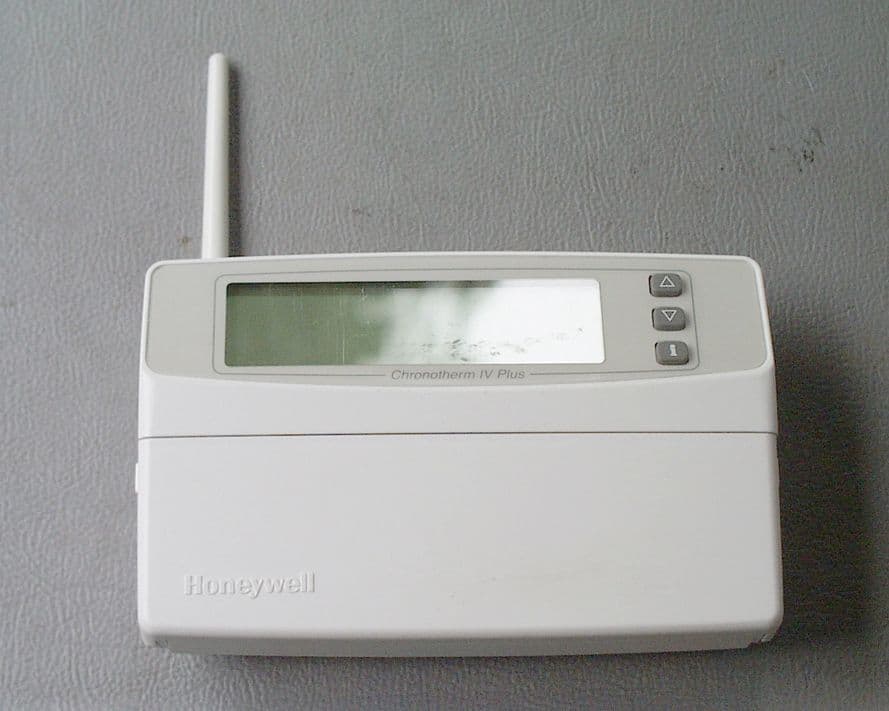 WIRELESS THERMOSTAT - FCC ID HS9-T8665D - Ademco Inc