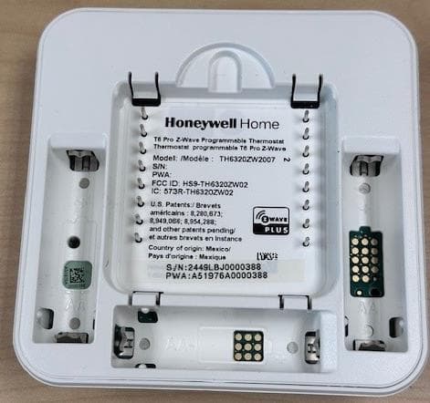 Wireless Alarm Transmitter - FCC ID HS9-TH6320ZW04 - Resideo LLC.