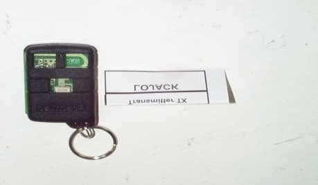 Security Transmitter - FCC ID IDIKF100 - CalAmp Wireless Networks Corporation