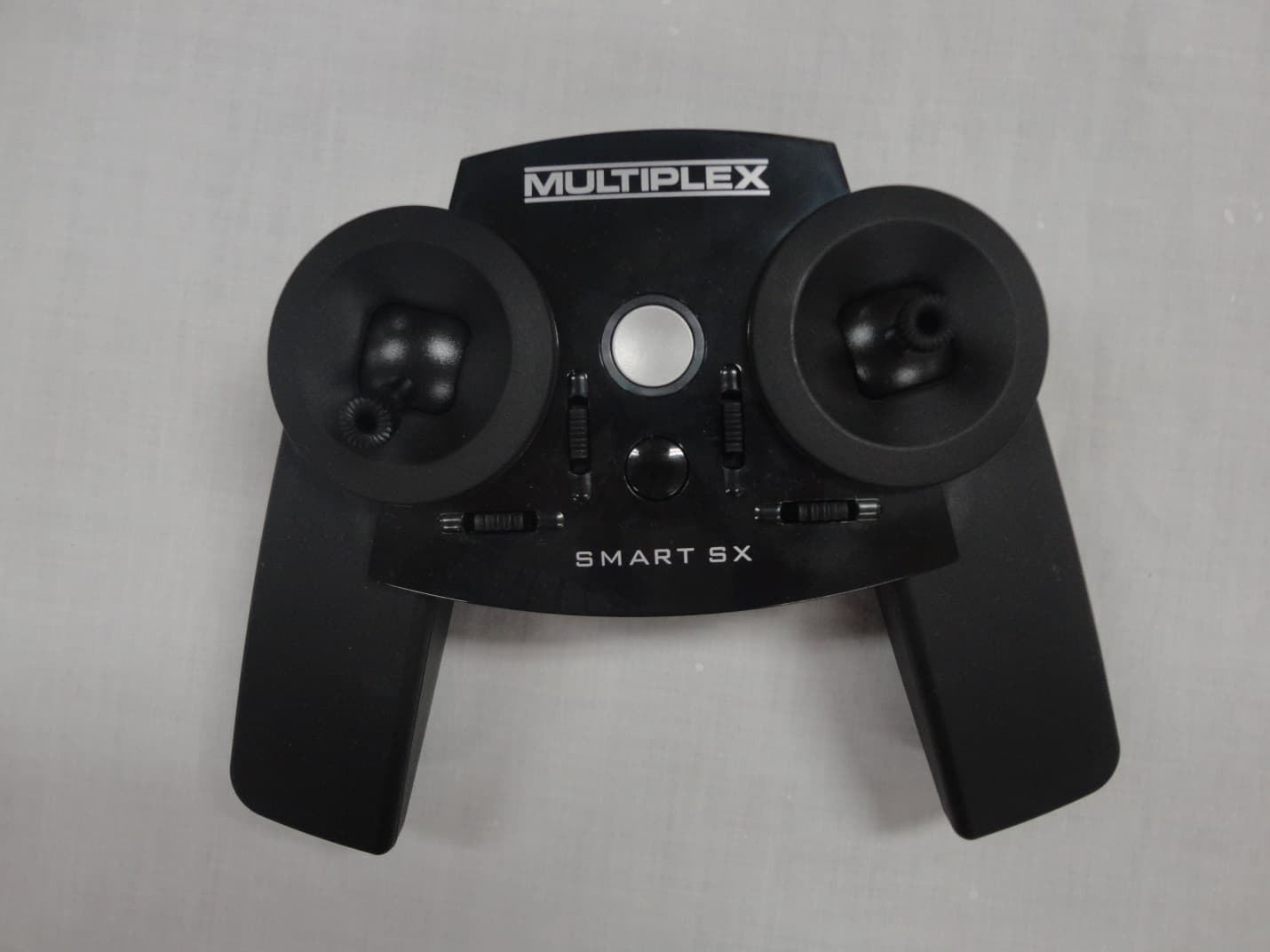 6 CHANNEL 2.4 GHz RADIO CONTROL TRANSMITTER - FCC ID IFHSMART-SX - Hitec RCD Inc.