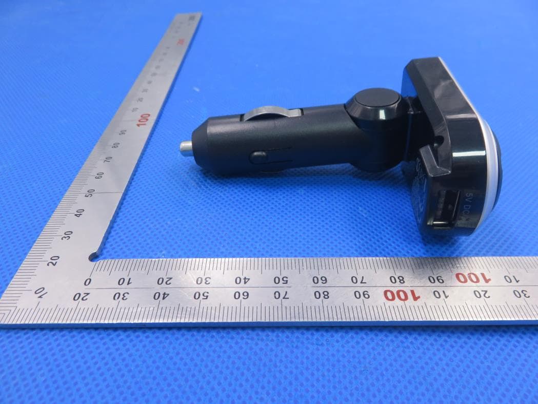 Wireless hands free car kit with Bluetooth and FM - FCC ID IKQBTFM3B - Scosche Industries Inc (5)