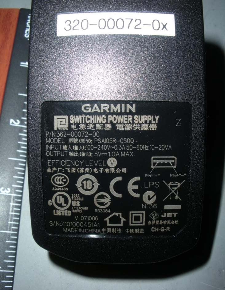 GSM/GPS enabled tracking device - FCC ID IPH-02421 - Garmin International Inc (1)