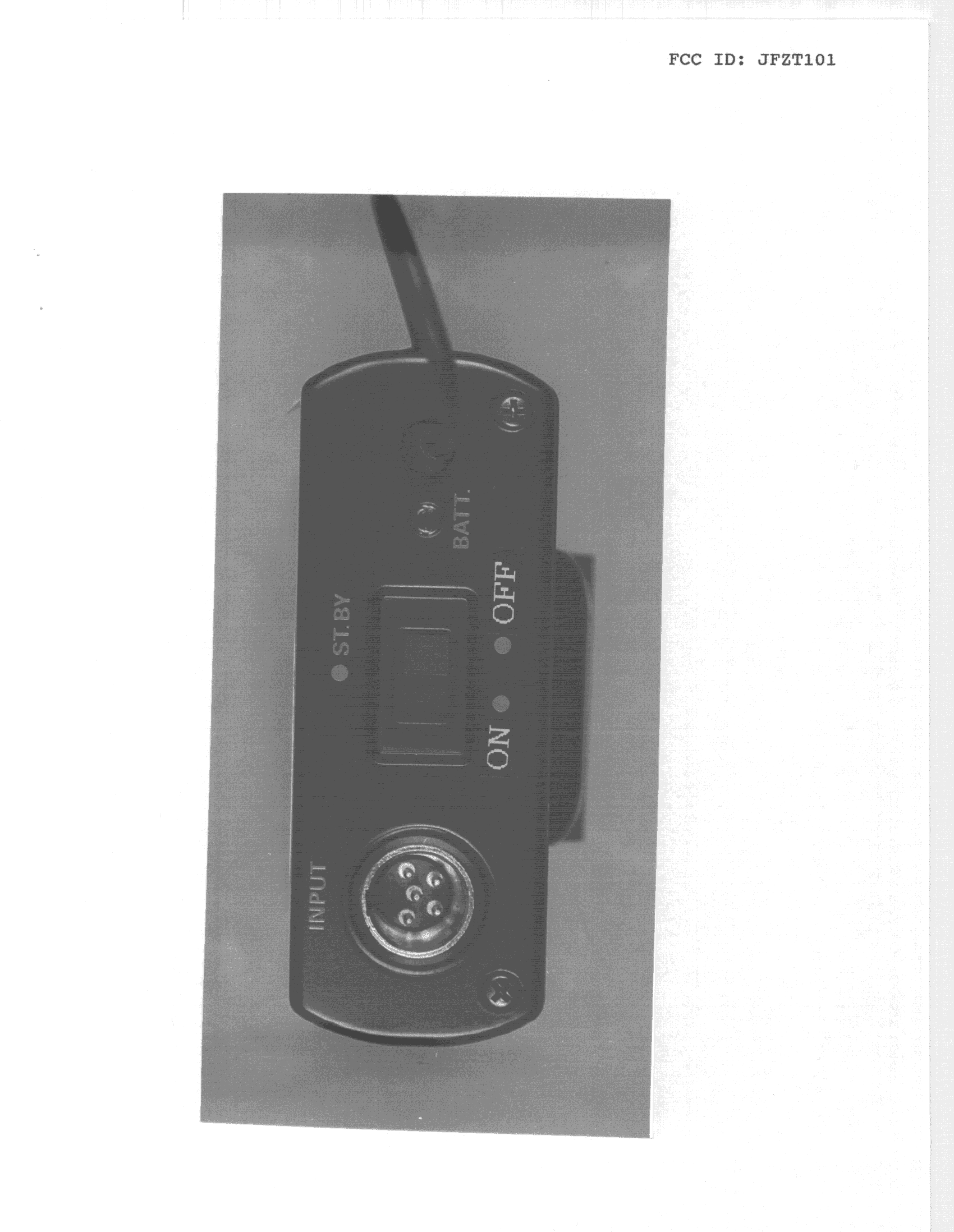 TBF - Licensed Broadcast Transmitter Held to Face - FCC ID JFZT101 - Audio-Technica Corporation (1)
