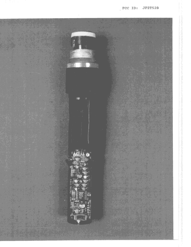 TBF - Licensed Broadcast Transmitter Held to Face - FCC ID JFZT52B - Audio-Technica Corporation (3)