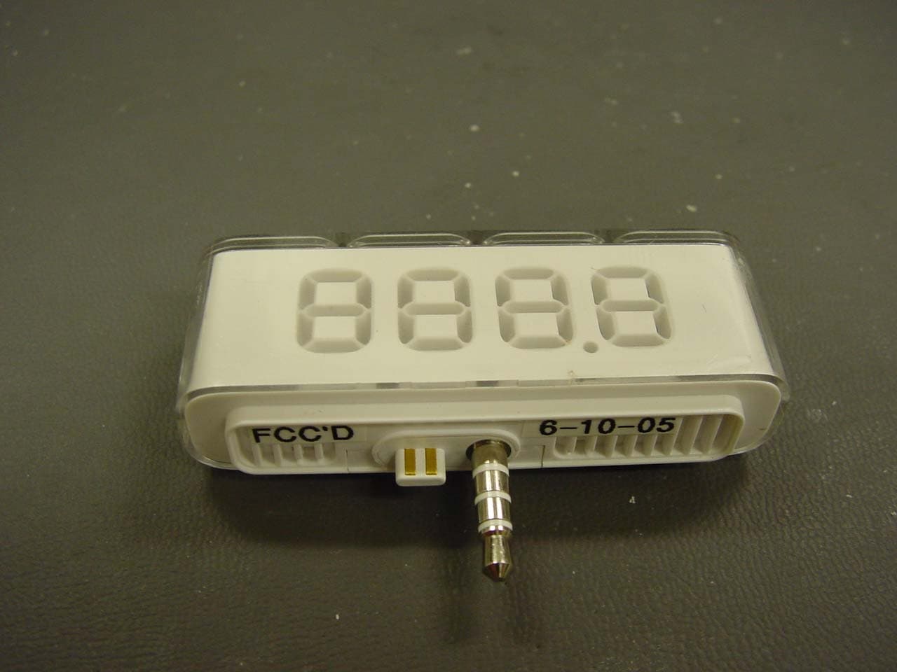 TuneFM - Model F8Z015 - FCC ID K7SF8Z015 - Belkin International, Inc.