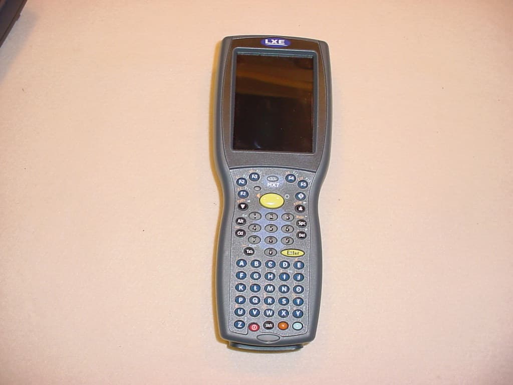 HAND-HELD MOBILE COMPUTER W/ WIRELESS DATA COM. - FCC ID KDZLXEMX7P1 - Honeywell International, Inc.