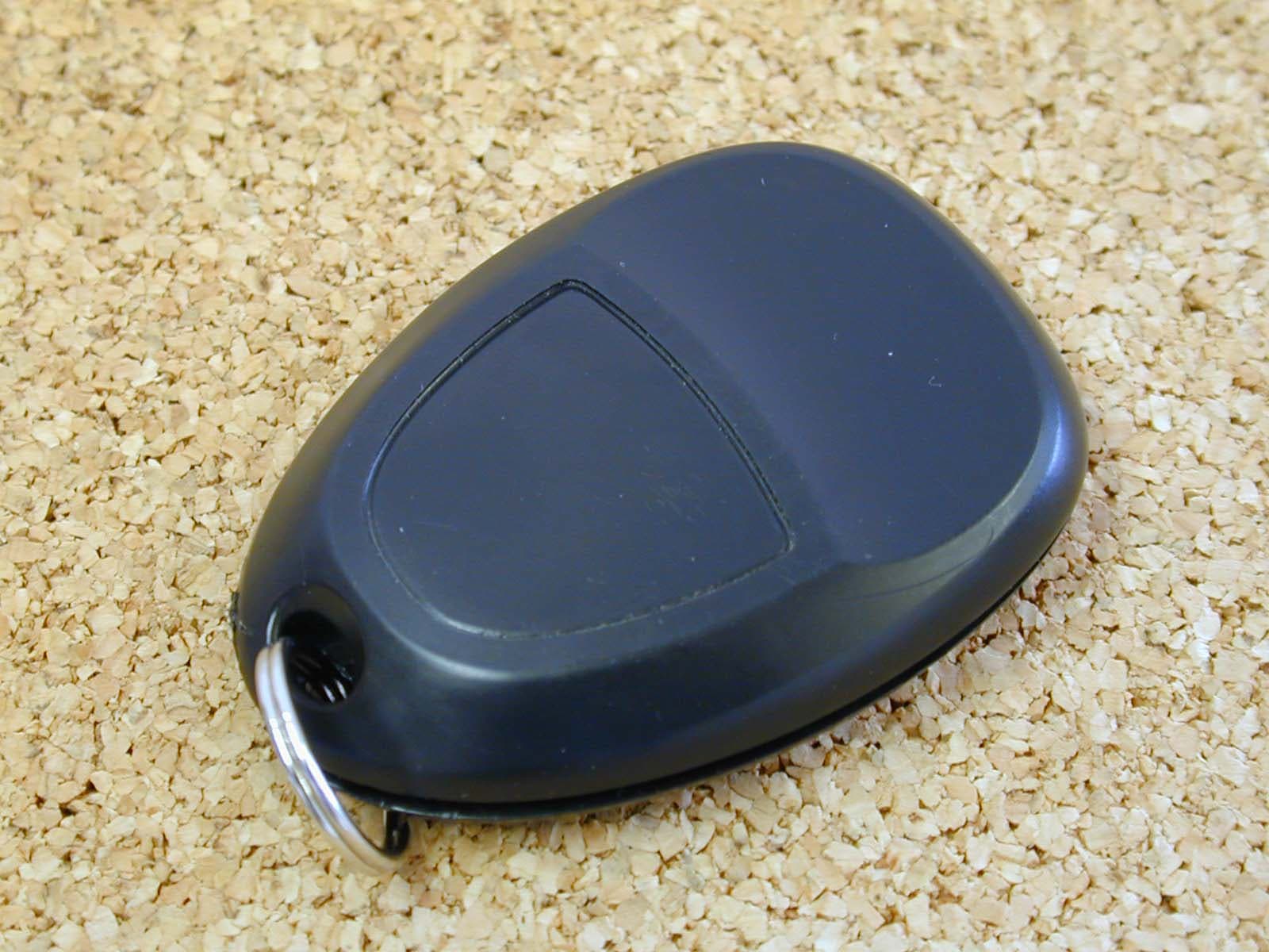 Car Keyless Entry Transmitter - FCC ID KOBGT04A - Lear Corporation