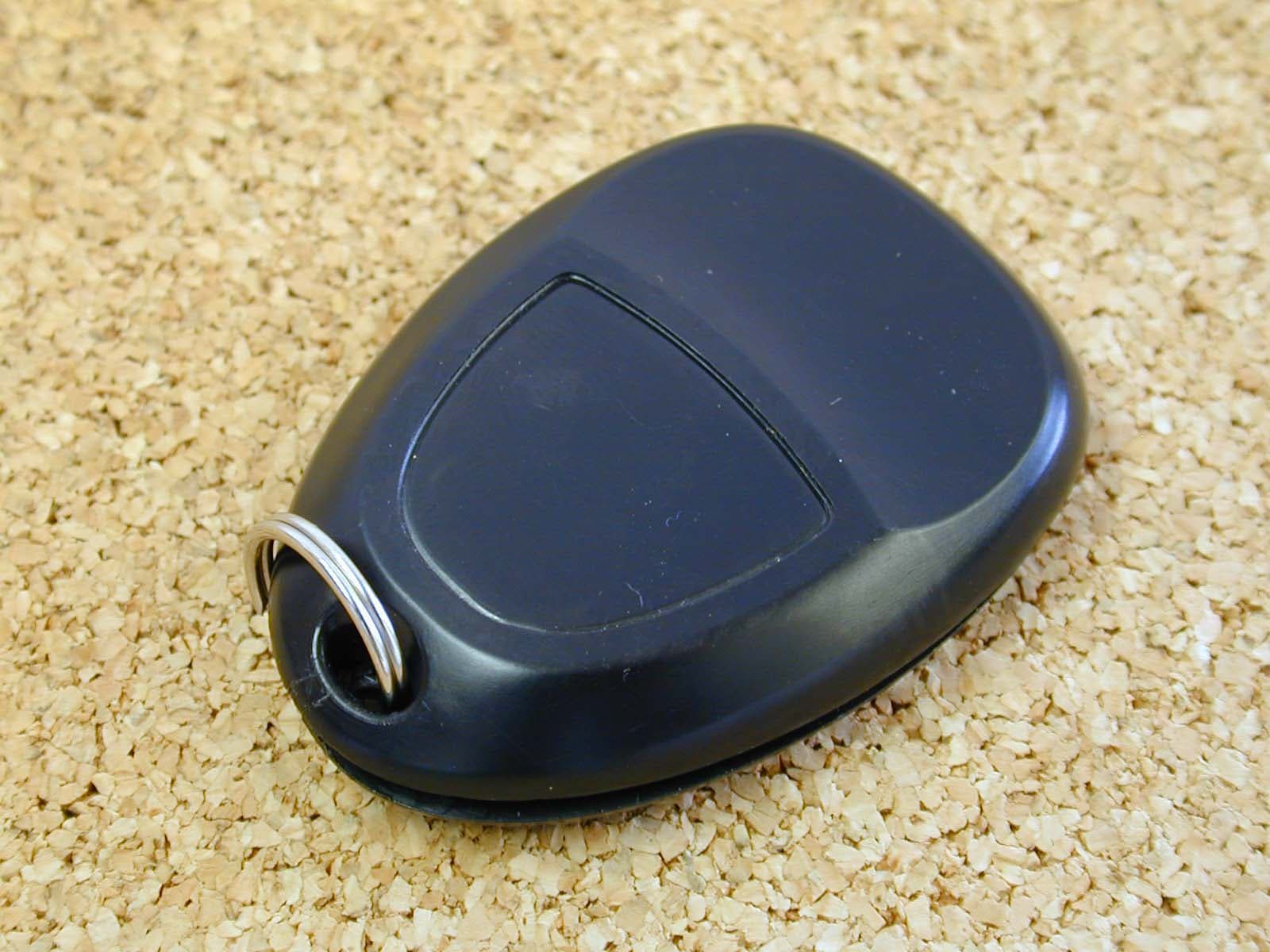 Car Keyless Entry Transmitter - FCC ID KOBGT04A - Lear Corporation (4)