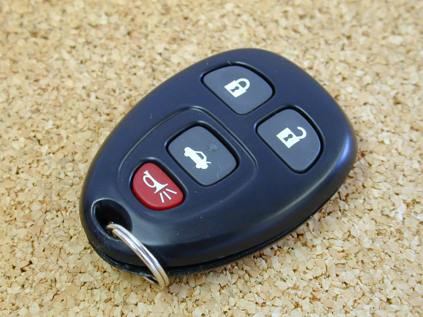 Car Keyless Entry Transmitter - FCC ID KOBGT04A - Lear Corporation (3)