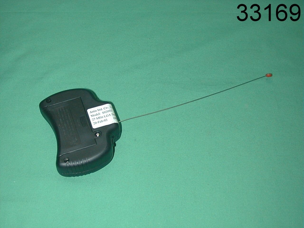 Remote Control Transmitter - FCC ID L9GS92003 - Artin Industrial Co Ltd