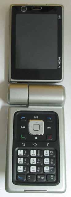 GSM E900/1800/1900 WCDMA2100 Cellular Phone - FCC ID LJPRM-100 - Microsoft Corporation