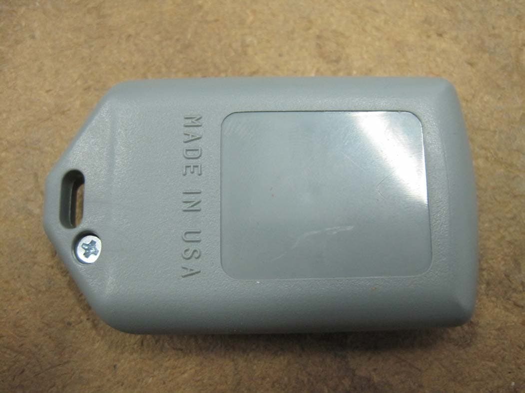 Handheld Garage Door Type RF Transmitter 418 MHz - FCC ID LSD72AT - DoorKing Inc