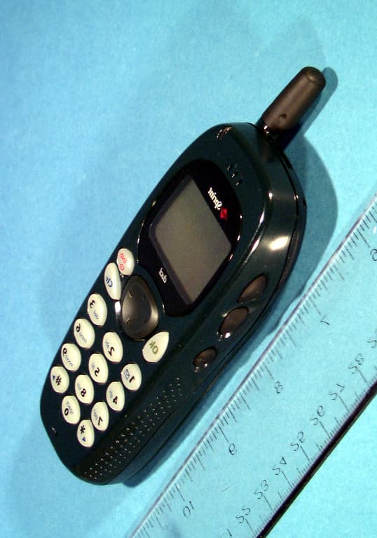 Dual-Band Analog/PCS Phone (AMPS/CDMA) - FCC ID LXC-E210 - DENSO International America, Inc (2)