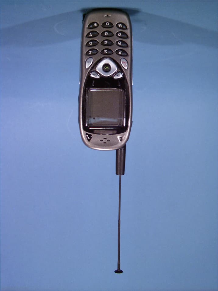 Dual-Band Analog/PCS Phone (AMPS/CDMA) - FCC ID LXC-E330 - DENSO International America, Inc (3)