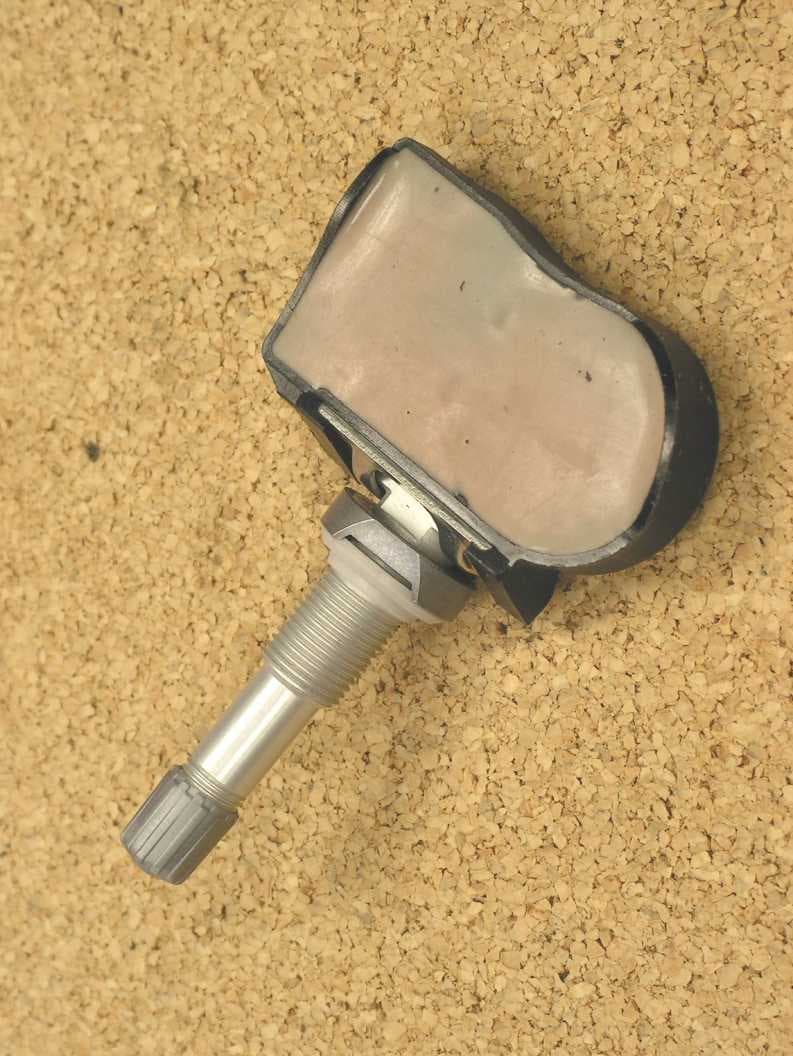 Tire Pressure Monitoring Transmitter - FCC ID M3N80157400 - Continental Automotive Systems, Inc. (1)