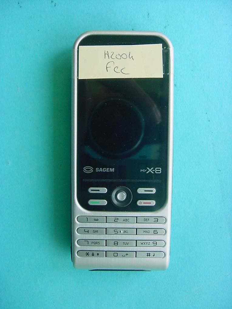 GSM 900/1800/1900 Mobile Phone with Bluetooth - FCC ID M9H95H04 - Sagem Wireless