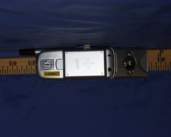 CELLULAR MOBILE PHONE AND MP3 PLAYER - FCC ID MBUNXC3200 - Standard Telecom Co Ltd (4)