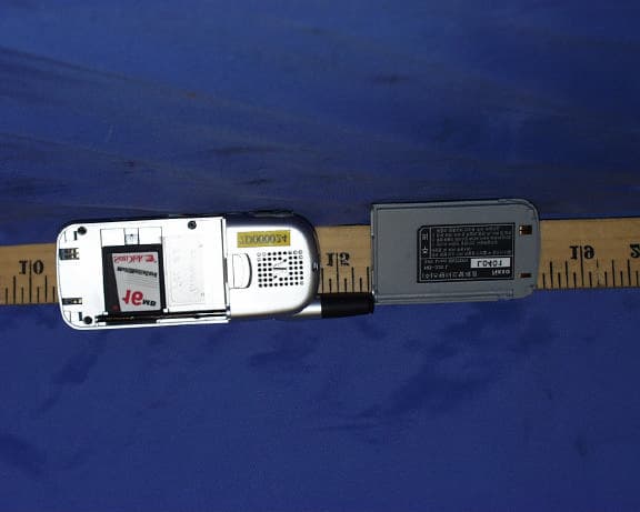 CELLULAR MOBILE PHONE AND MP3 PLAYER - FCC ID MBUNXC3200 - Standard Telecom Co Ltd