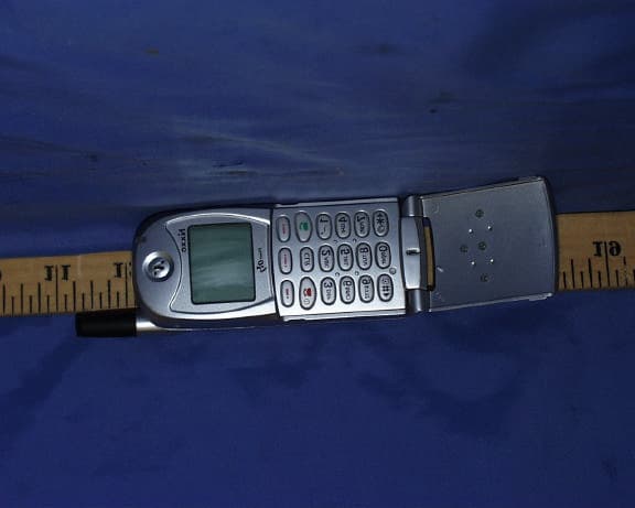 CELLULAR MOBILE PHONE AND MP3 PLAYER - FCC ID MBUNXC3200 - Standard Telecom Co Ltd (2)