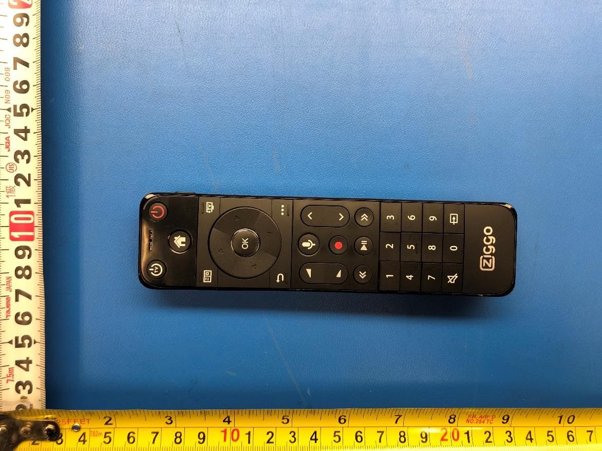 Remote Control - FCC ID MG3-R328451 - Universal Electronics Inc