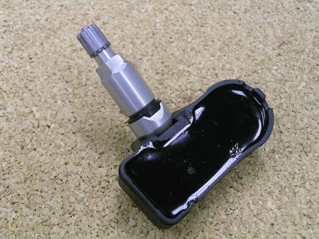 Tire Pressure Transmitter - FCC ID MRXDCA315TX1 - Schrader Electronics (2)