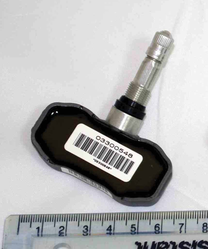 Tire Pressure Monitoring Transmitter - FCC ID MRXGMG2R3FM - Schrader Electronics