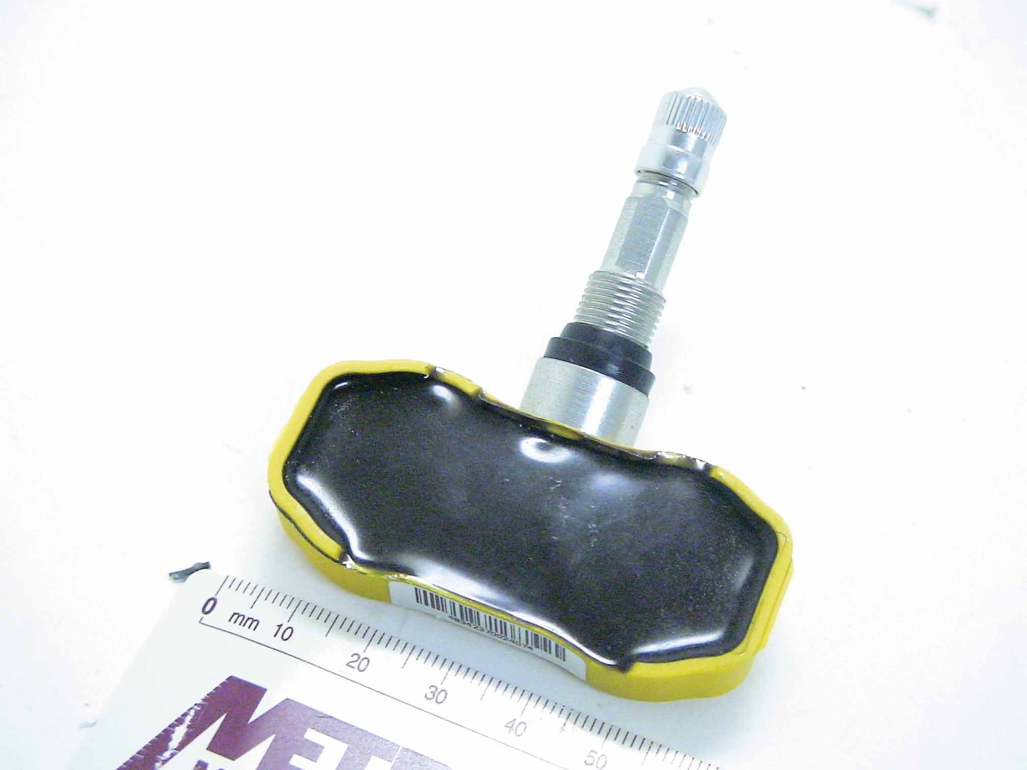 Tire Pressure Monitoring Transmitter - FCC ID MRXGMG2R4AM - Schrader Electronics