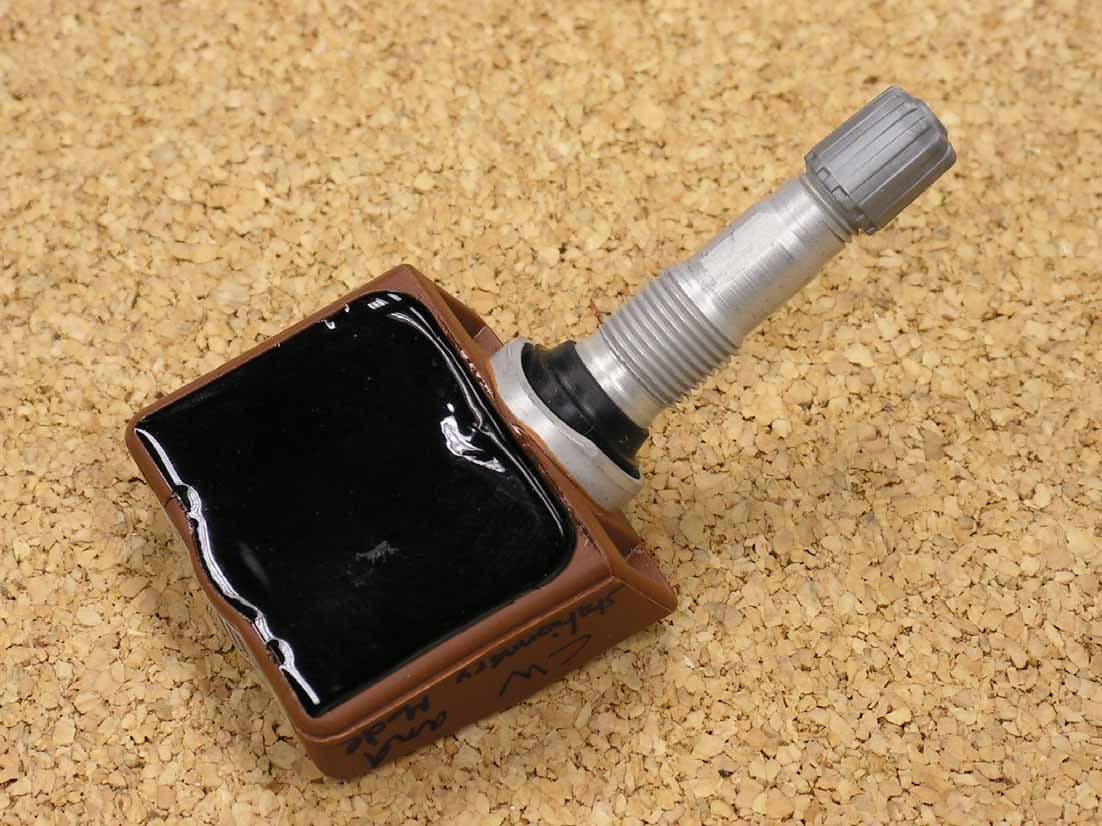 Tire Pressure Transmitter - FCC ID MRXNG33MA4S - Schrader Electronics