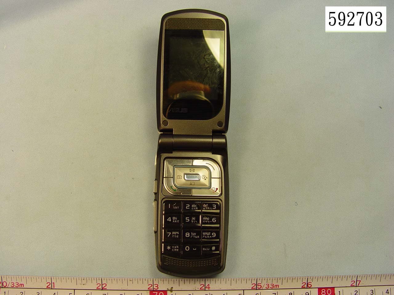 Triple Band GSM/GPRS Mobile Phone w/BT - FCC ID MSQJ201 - ASUSTeK Computer Inc (3)