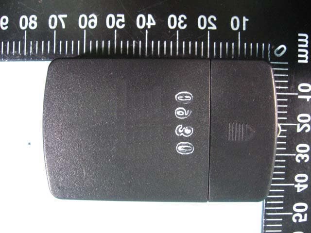 REMOTE CONTROL GARAGE DOOR OPENER TRANSMITTER - FCC ID N6U303NTX - GUARDIAN SHANGHAI CORP.