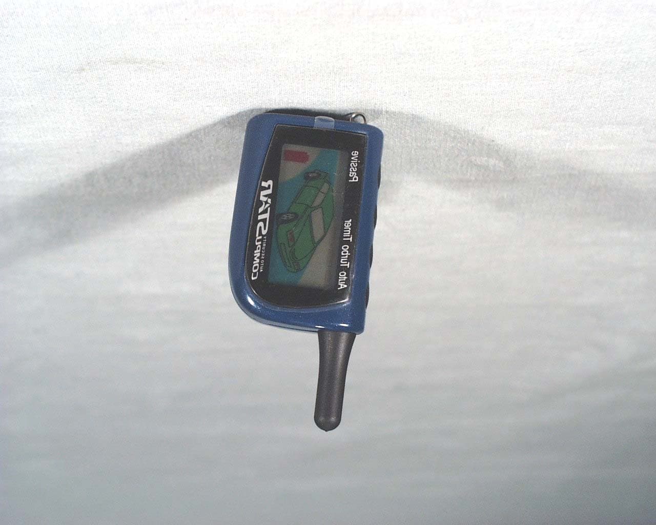 Remote portion of car starting and alarm system - FCC ID N99J2WFMR - Firstech, Inc. (2)