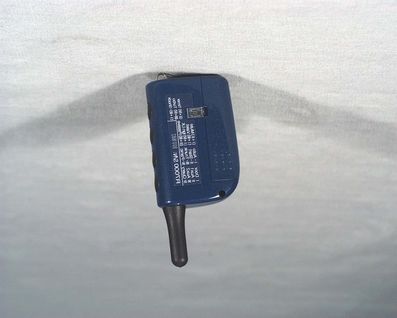 Remote portion of car starting and alarm system - FCC ID N99J2WFMR - Firstech, Inc.