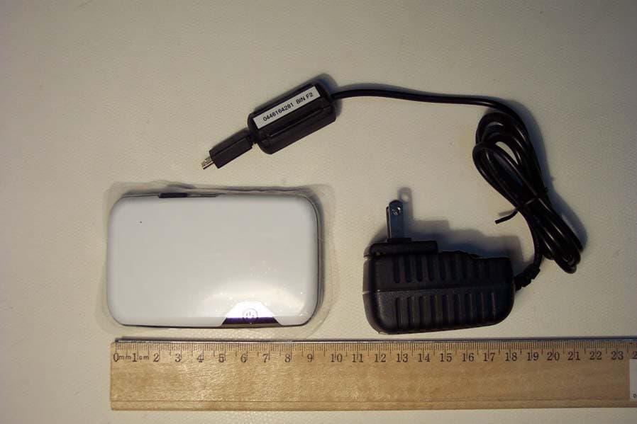 GSM/WCDMA USB WWAN Modem w/WLAN - FCC ID NBZNRM-MIFI2352R - Novatel Wireless, Inc. (2)
