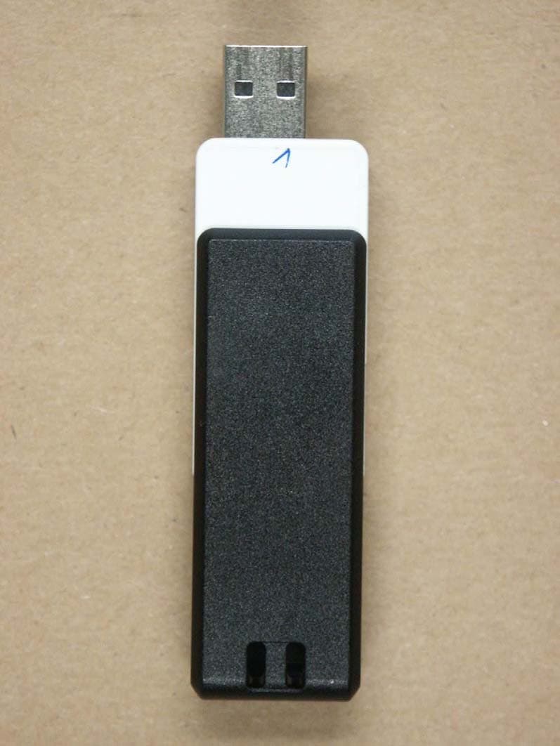 Quadband GSM/GPRS/EDGE and Triband UMTS/HSDPA/HSUPA USB Modem - FCC ID NCMOGI0322 - Option (Crescent NV) (2)