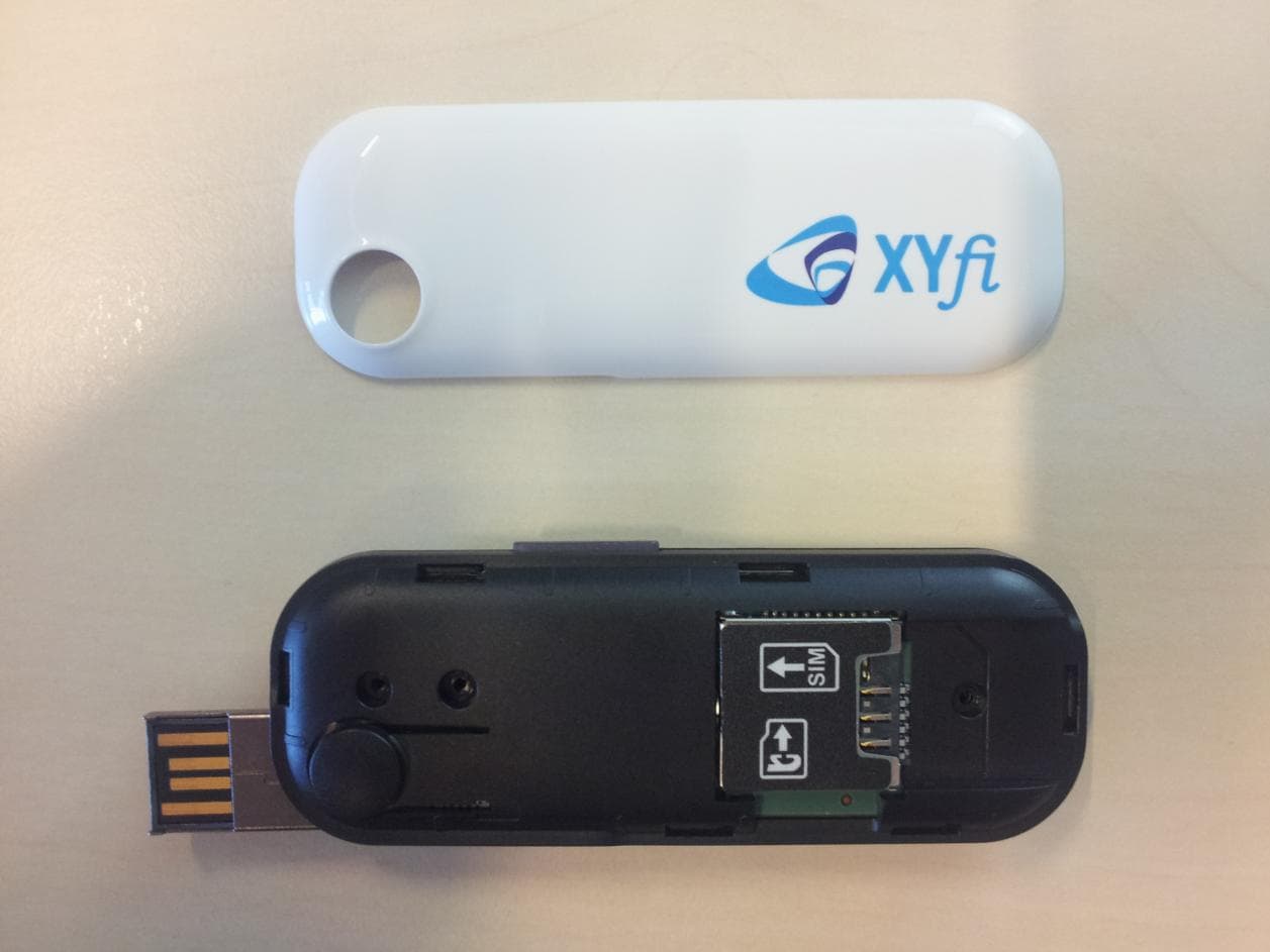 Quadband GSM/GPRS/EDGE Triband UMTS/HSDPA/HSUPA USB Modem - FCC ID NCMOGI0643 - Option (Crescent NV)