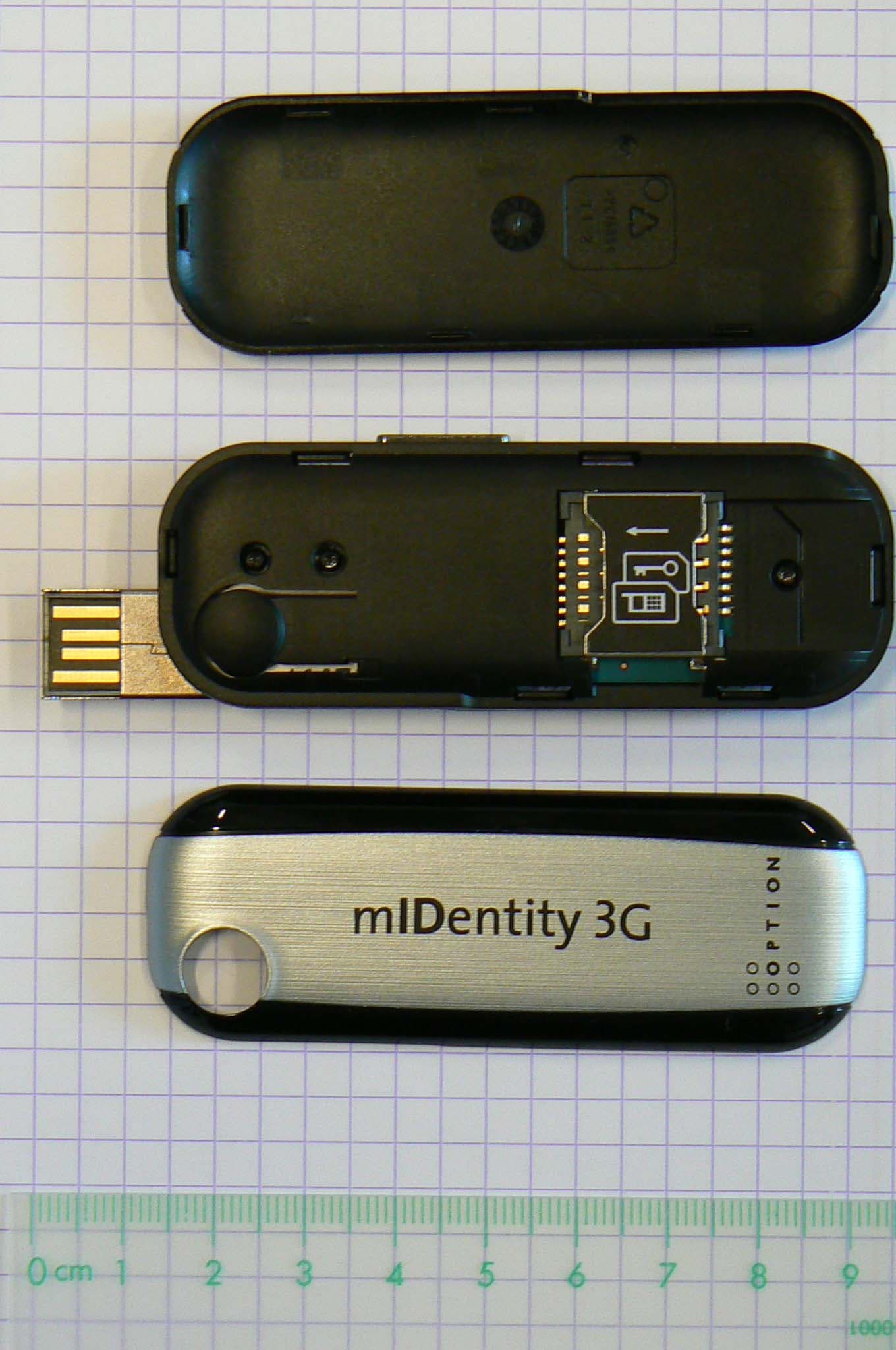 Quadband GSM/GPRS/EDGE Triband UMTS/HSDPA/HSUPA USB Modem - FCC ID NCMOGI0653 - Option (Crescent NV) (2)