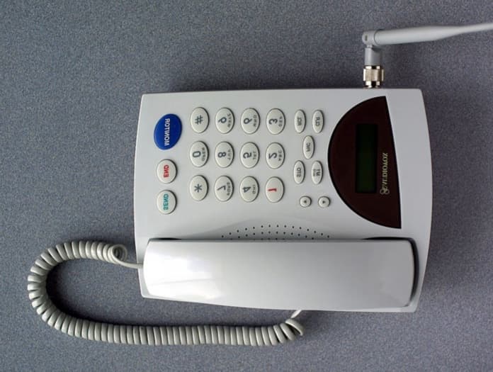 Fixed Wireless Cellular Desktop Phone - FCC ID NJIFW8100 - CSI Wireless