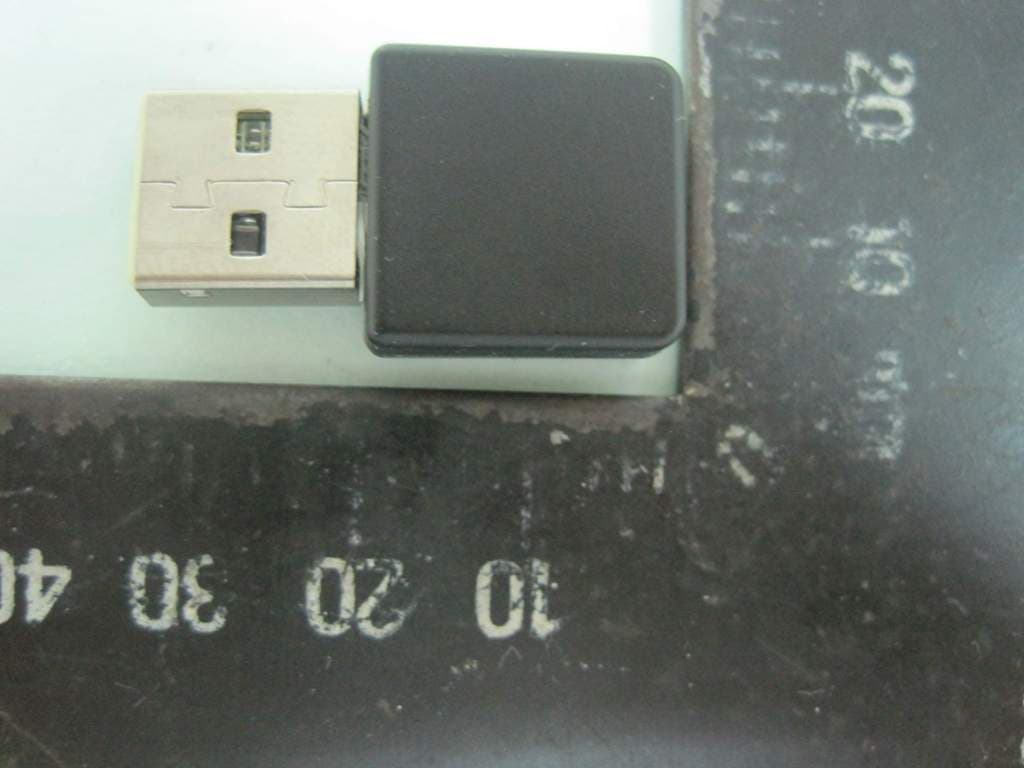WLAN 802.11 b/g/n USB Adapter - FCC ID NKR-DNUA93F - Wistron NeWeb Corporation (2)